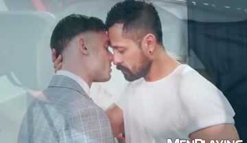 Suited stud Cristian Sam drills Manuel Reyes ass deep in office